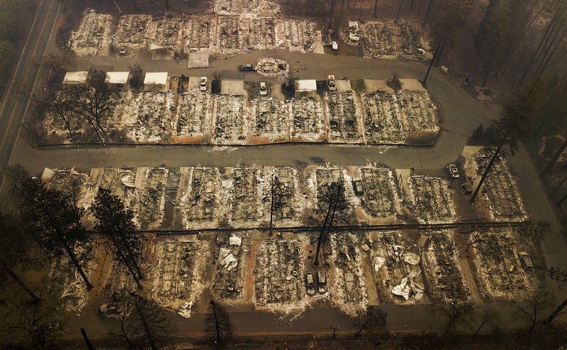 Residences were leveled by the wildfire in Paradise, Calif., on Thursday, Nov. 15, 2018. The California Department of Forestry and Fire Protection said Thursday the wildfire that destroyed the town of Paradise is now 40 percent contained, up from 30 percent Wednesday morning. (AP Photo/Noah Berger)