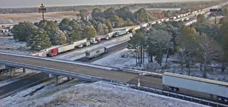 Traffic is shown stopped along Interstate 40 between Forrest City and Brinkley in these photos released by the Arkansas Department of Transportation.