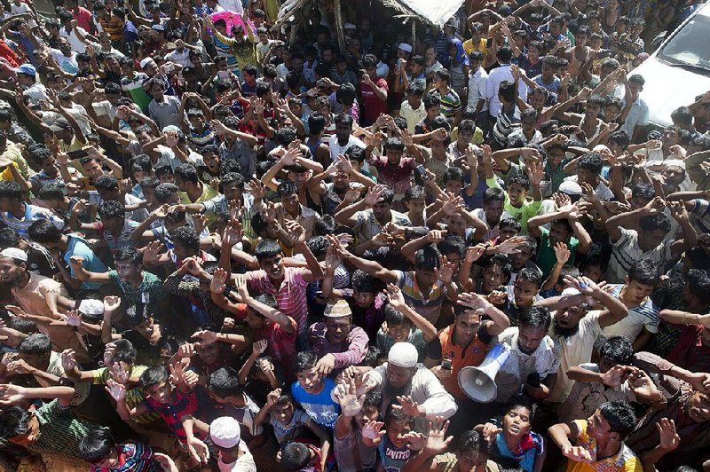 Rohingya refugees demonstrate against the repatriation process Thursday at the Unchiprang refugee camp near Cox’s Bazaar, Bangladesh, spurning offers of buses, trucks and food. 