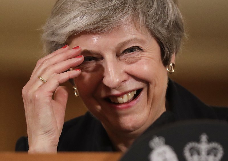 Britain's Prime Minister Theresa May reacts during a press conference inside 10 Downing Street in London, Thursday, Nov. 15, 2018. British Prime Minister Theresa May says if politicians reject her Brexit deal, it will set the country on &quot;a path of deep and grave uncertainty.&quot; Defiant in the face of mounting criticism, May said Thursday she believed &quot;with every fiber of my being&quot; that the deal her government struck with the European Union was the right one. (AP Photo/Matt Dunham, Pool)