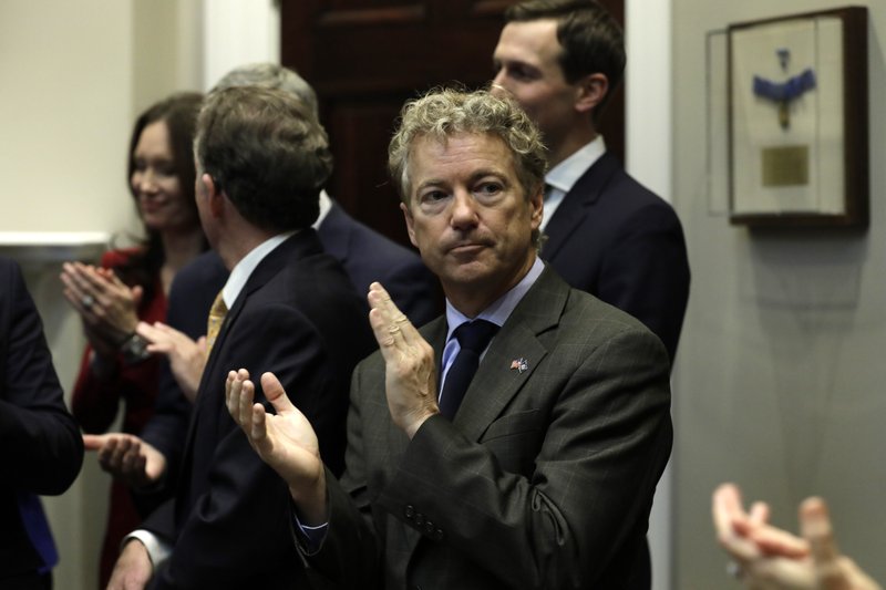 Sen. Rand Paul applauds during a signing ceremony for the First Step Act, in the White House in Washington on Nov. 14, 2018; Paul led the effort to block the sale of attack helicopters, missiles and other munitions to Bahrain. MUST CREDIT: Bloomberg photo by Yuri Gripas.
