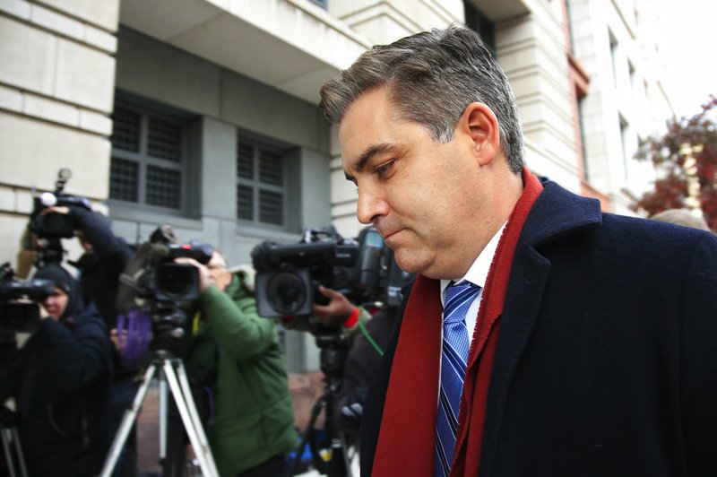 In this Nov. 14, 2018, photo, CNN's Jim Acosta walks into federal court in Washington, to attend a hearing on a legal challenge against President Donald Trump's administration. 