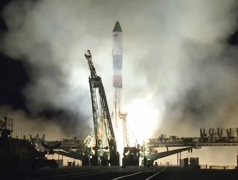 In this photo distributed by Roscosmos Space Agency Press Service on Friday, Nov. 16, 2018, Russian cargo ship Souz FG with the Progress MS-10 takes off from the launch pad at Russia's main space facility in Baikonur, Kazakhstan. A Russian Soyuz rocket has put a cargo ship en route to the International Space Station, clearing the way for the next crewed mission. (Roscosmos Space Agency Press Service photo via AP)