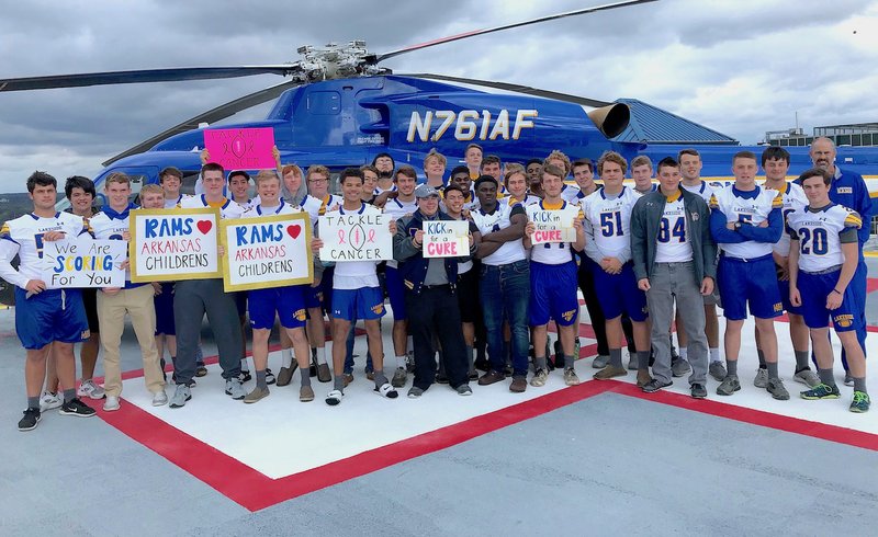 Submitted photo LAKESIDE ONE: Lakeside football players visited Arkansas Children Hospital's transport area last month and learned about the Angel One Program.