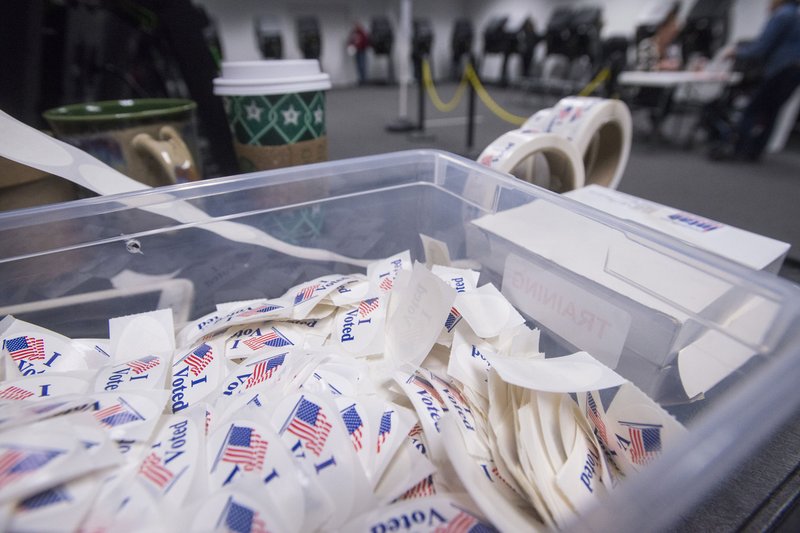 NWA Democrat-Gazette File Photo/BEN GOFF 'I Voted' stickers for early voters Saturday, Nov. 3, 2018, at the Benton County Election Commission office in Rogers.