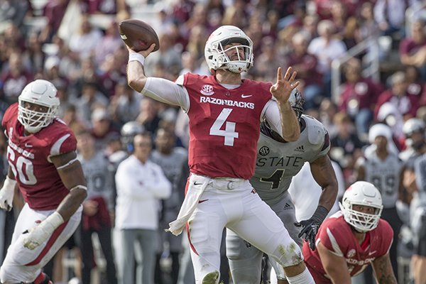 Arkansas quarterback Ty Storey throws a pass during a game against Mississippi State on Saturday, Nov. 17, 2018, in Starkville, Miss. 