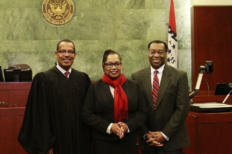 Lisa Peters (center) , the new federal public defender for the Eastern District of Arkansas, is shown in this photo.