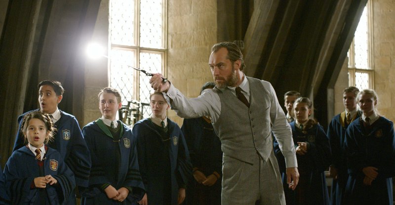 This image released by Warner Bros. Pictures shows Jude Law in a scene from "Fantastic Beasts: The Crimes of Grindelwald." (Warner Bros. Pictures via AP)