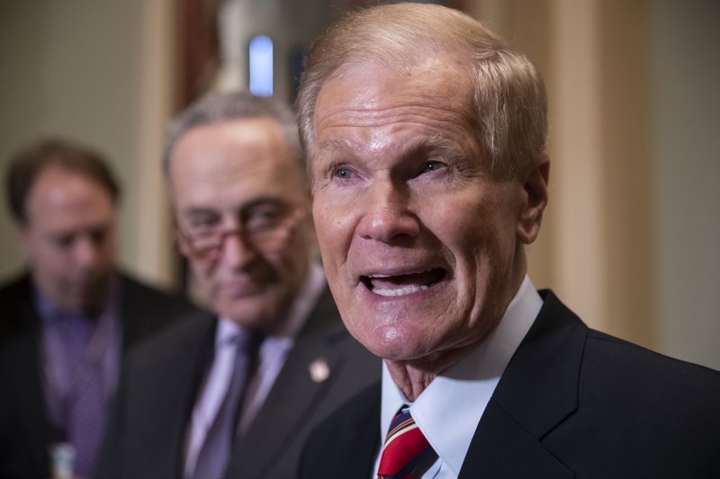 In this Tuesday, Nov. 13, 2018, file photo Sen. Bill Nelson, D-Fla., is joined by Senate Minority Leader Charles Schumer, D-N.Y., at a news conference at the Capitol in Washington.(AP Photo/J. Scott Applewhite)