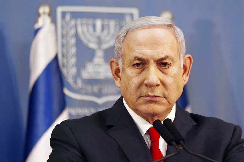 Israeli Prime Minister Benjamin Netanyahu delivers a statement in Tel Aviv, Israel, on Sunday.