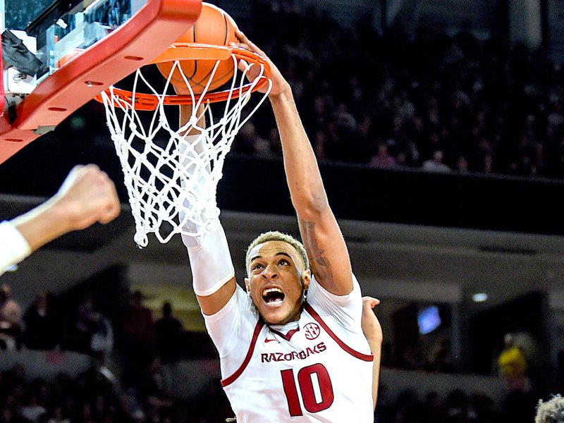 Special to The Sentinel-Record/Craven Whitlow SLAM IT HOME: Arkansas sophomore center Daniel Gafford throws down a dunk Sunday against Indiana during the Razorbacks' 73-72 win over the Hoosiers at Bud Walton Arena in Fayetteville.