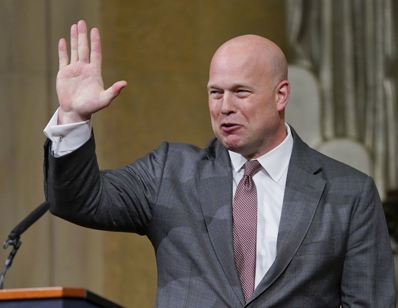 Acting Attorney General Matthew Whitaker gestures after speaking at the Dept. of Justice's Annual Veterans Appreciation Day Ceremony, Thursday, Nov. 15, 2018, at the Justice Department in Washington. (AP Photo/Pablo Martinez Monsivais)

