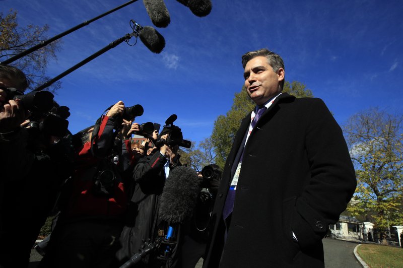 CNN's Jim Acosta speaks to journalists on the North Lawn upon returning back to the White House in Washington, Friday, Nov. 16, 2018. U.S. District Court Judge Timothy Kelly ordered the White House to immediately return Acosta’s credentials. He found that Acosta was “irreparably harmed” and dismissed the government’s argument that CNN could send another reporter in Acosta’s place to cover the White House. (AP Photo/Manuel Balce Ceneta)

