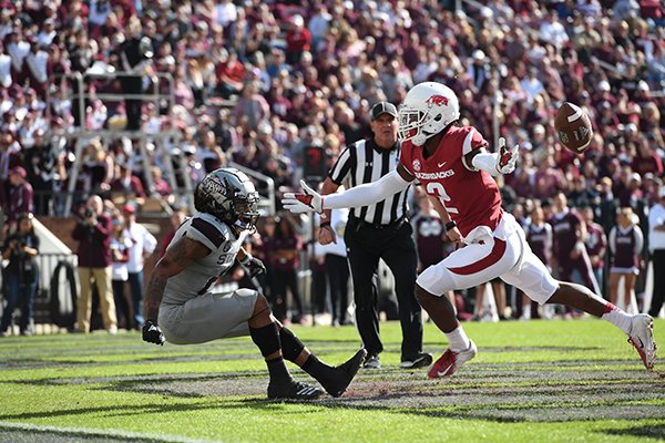 Arkansas safety Kamren Curl (2) defends a Mississippi State receiver on an incomplete pass Saturday, Nov. 17, 2018, in Starkville, Miss. 