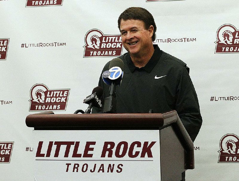 UALR women's basketball coach Joe Foley laughs while talking about the difficulty of the Lady Trojans' non-conference schedule during the Trojans' media day on Thursday, Oct. 25, 2018, at the Jack Stephens Center. 