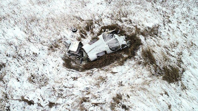 This Monday photo provided by the Morton County sheriff’s office shows the wreckage of a twin-engine Bismarck Air Medical aircraft that crashed late Sunday, about 20 miles northwest of Bismarck, N.D., killing all three on board. 