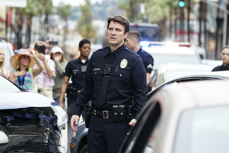 Nathan Fillion stars as John Nolan, a 40-year-old Los Angeles Police Dept. trainee in The Rookie. The series, which has a racially diverse cast, is among a wave of new shows that are taking on political correctness. 