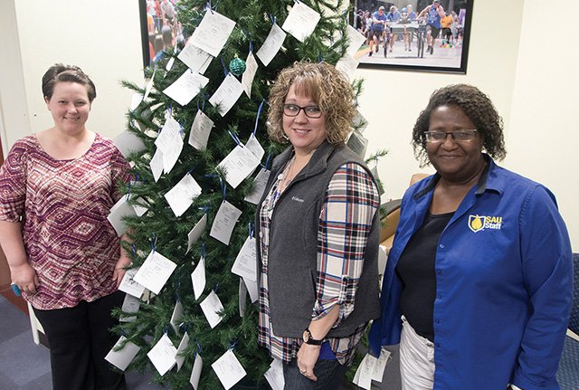 Sandra Martin, from left, Jennifer Ford and Lillie Wright of SAU University Housing help lead the charge each year for the Columbia County Angel Tree.