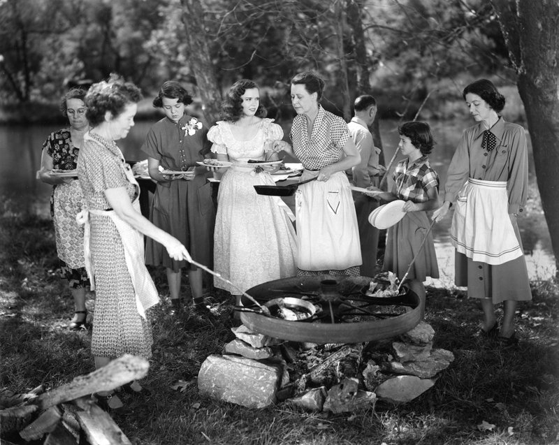 Courtesy Shiloh Museum of Ozark History
Fish-fry scene from Wonder Valley, Cave Springs, September 1951. Hollywood actresses Gloria Jean and Louise Lorimer (center left & right) and local extras Howard Clark, Sue Curtis, and Caroline Clark (right of center, from left to right).

