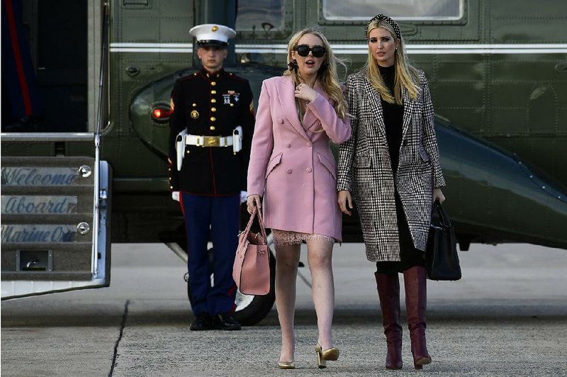 Ivanka Trump (right) and her half sister Tiffany Trump leave Marine One on Tuesday to board Air Force One at Andrews Air Force Base, Md., for a family Thanksgiving trip to President Donald Trump’s Mar-a-Lago resort in south Florida. 