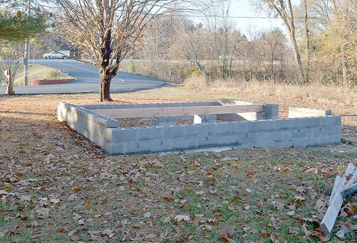 Keith Bryant/The Weekly Vista A foundation for the Bella Vista Historical Museum's more-than-a-century-old cabin, dubbed the Settlers Cabin, is complete and the cabin is expected to be moved in the next week or two, weather permitting.