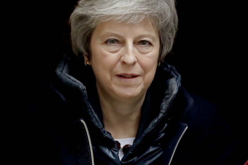 British Prime Minister Theresa May leaves 10 Downing Street in London, to attend Prime Minister's Questions at the Houses of Parliament, Wednesday, Nov. 21, 2018. (AP Photo/Matt Dunham)