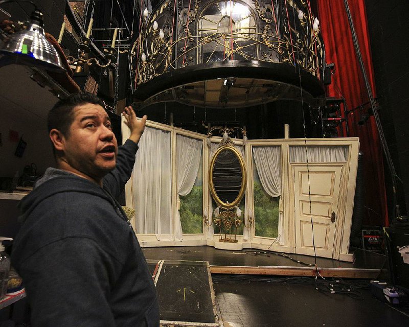 Company manager Aaron Quintana talks Wednesday backstage at the Robinson Center Performance Hall in Little Rock about some of the sets used for the production of Andrew Lloyd Webber’s Love Never Dies. The show runs through Sunday. 