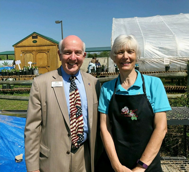 Courtesy photo Bella Vista Mayor Peter Christie poses for a picture with Cathy Downard at a Bella Vista Garden Club event in May 2018.