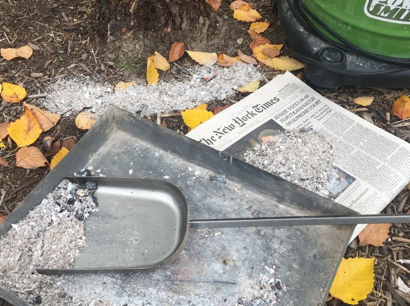 This Oct. 21, 2018 photo of wood stove ashes on a property near Langley, Wash., shows a nutrient-rich sample free of any residue from pressure-treated wood, painted wood or cardboard. They carry chemicals that can damage plants. The same goes for using charcoal from BBQ grills, fake fireplace logs and coal. Good quality wood ash is a soil amendment bonus for gardeners but beware using any containing additives. (Dean Fosdick via AP)