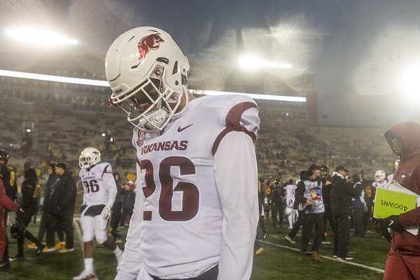 Arkansas special teams player Ryder Lucas (26) walks off the field following the Razorbacks' 38-0 loss to Missouri on Friday, Nov. 23, 2018, in Columbia, Mo.