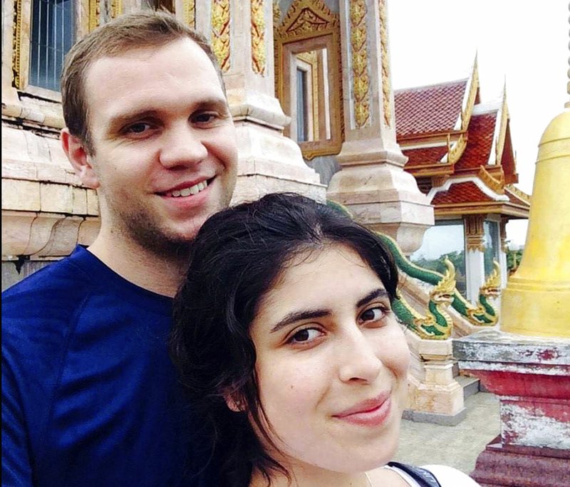 FILE - In this undated family photo, showing Matthew Hedges with his wife Daniela Tejada. The United Arab Emirates has pardoned British academic researcher Matthew Hedges who was arrested May 5, 2018, at Dubai Airport and subsequently convicted and sentenced to life in prison for alleged espionage. (Daniela Tejada via AP, FILE)

