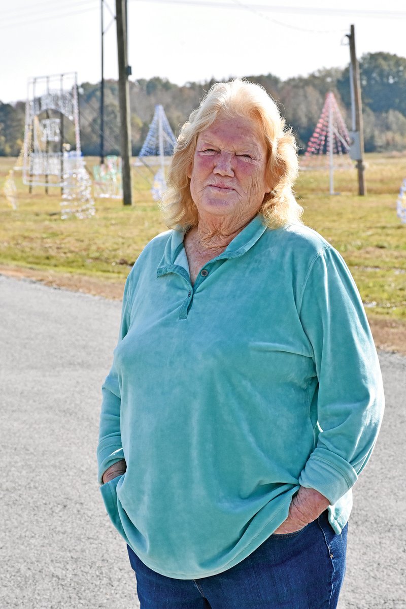 Ruby Suviaz of Bald Knob stands near some of the light displays that will be part of the Foothills Lane of Lights, a nonprofit organization she created. The lights will be turned on at 5 p.m. Saturday, and a live Nativity, carriage rides and a Santa house will be part of the festivities on Friday and Saturday nights through Dec. 23. The lights will continue until Jan. 1.