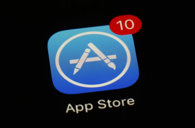 FILE - This March 19, 2018, file photo shows Apple's App Store app in Baltimore. Apple is at the Supreme Court to defend the way it sells apps for iPhones against claims by consumers that the company has unfairly monopolized the market. The justices are hearing arguments Monday, Nov. 26, in Apple&#x2019;s effort to end an antitrust lawsuit that could force the iPhone maker to cut the 30 percent commission it charges software developers whose apps are sold exclusively through Apple&#x2019;s App Store. (AP Photo/Patrick Semansky, File)