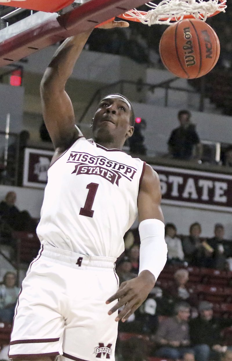 Mississippi State forward Reggie Perry (1) dunks during the first half of san NCAA college basketball game against Alcorn State, Monday, Nov. 26, 2018, in Starkville, Miss. (AP Photo/Jim Lytle)