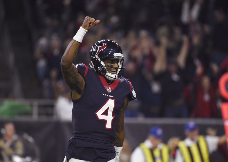 Houston Texans quarterback Deshaun Watson (4) celebrates after connecting with wide receiver Demaryius Thomas for a touchdown against the Tennessee Titans during the first half of an NFL football game, Monday, Nov. 26, 2018, in Houston. (AP Photo/Eric Christian Smith)