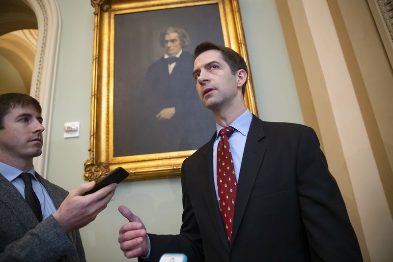 Sen. Tom Cotton, R-Ark., speaks to reporters as he arrives for a meeting with fellow Republicans, including Vice President Mike Pence and President Donald Trump's son-in-law, Jared Kushner, who are at the Capitol to discuss the nation's criminal justice sentencing laws, in Washington, Tuesday, Nov. 27, 2018. (AP Photo/J. Scott Applewhite)