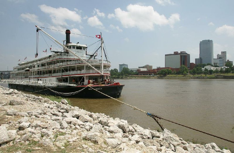 The Delta Queen, shown on the North Little Rock shore of the Arkansas River in 2007, will once again be able to ply the Arkansas and Mississippi rivers on overnight cruises after the U.S. House voted Tuesday to exempt the largely wooden steamboat from federal fire safety laws. The 1920s-era paddle-wheeler, now docked in Houma, La., will have to undergo extensive restoration.
