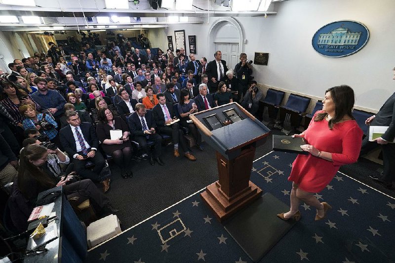 White House press secretary Sarah Huckabee Sanders (right) said Tuesday at a news briefing that President Donald Trump has “no intent” of firing special counsel Robert Mueller. 