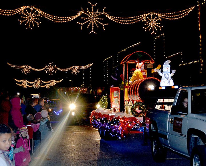 File photo The annual Christmas parade made its way down Broadway Street. The 2018 parade, hosted by the Heritage League of Siloam Springs, will begin around 5:30 p.m., Saturday.