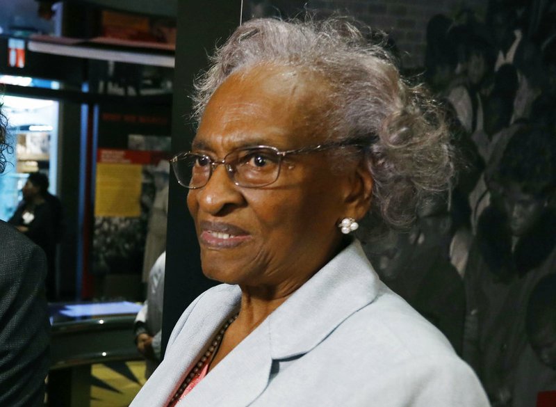 In this Nov. 10, 2017 file photo, Ellie Dahmer views the exhibits at the Mississippi Civil Rights Museum during a private preview in Jackson, Miss. The widow of a slain civil rights activist, Vernon Dahmer, says she forgives the person who draped a Confederate battle flag over her husband's gravesite. Dahmer tells The Associated Press on Wednesday, Nov. 28, 2018, that her family was told that the black woman who left the flag Tuesday did it to protest "how much hate was in that Confederate flag." (AP Photo/Rogelio V. Solis, File)