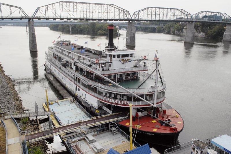 FILE - In this Sept. 25, 2013, file photo, the Delta Queen riverboat is moored at Coolidge Park on in downtown Chattanooga, Tenn. The U.S. House on Tuesday, Nov. 218, 2018, approved a bill that will allow the Delta Queen to cruise the nation's rivers once again after a 10-year layoff. President Donald Trump must still sign the bill. (John Rawlston/Chattanooga Times Free Press via AP, File)