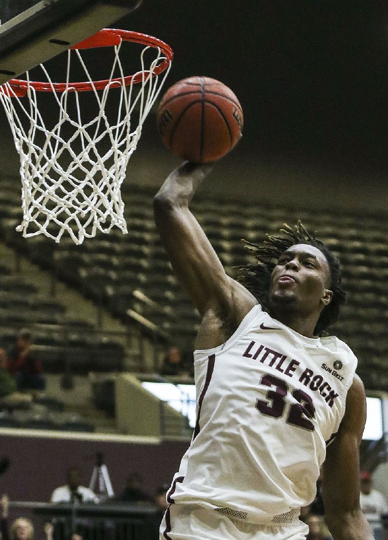 UALR forward Kris Bankston (32) and the Trojans play Stephen F. Austin today at the Jack Stephens Center in Little Rock.