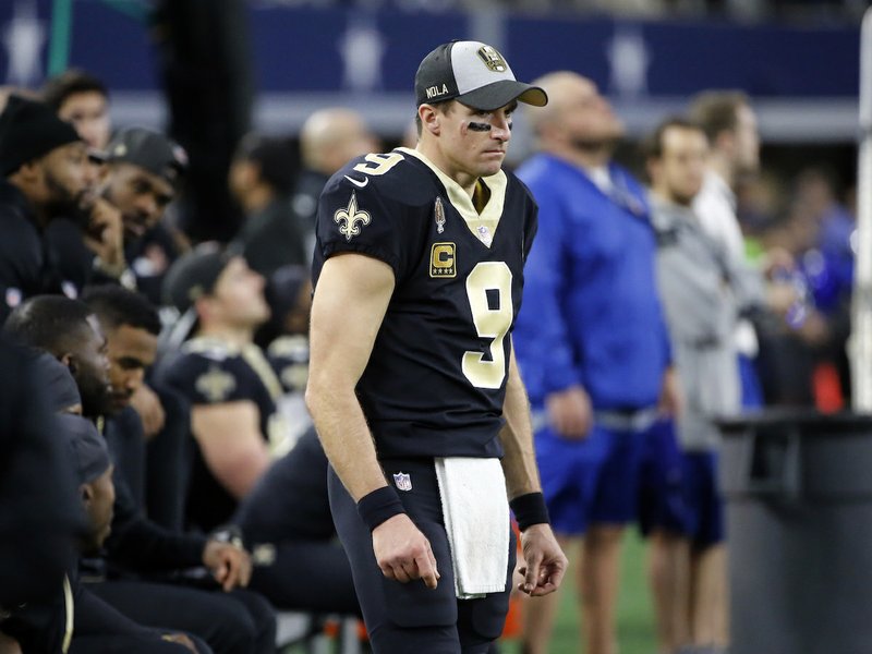 The Associated Press SEASON LOW: New Orleans quarterback Drew Brees (9) stands on the sidelines Thursday during the first half of the Saints' 13-10 loss to the Dallas Cowboys in Arlington, Texas.