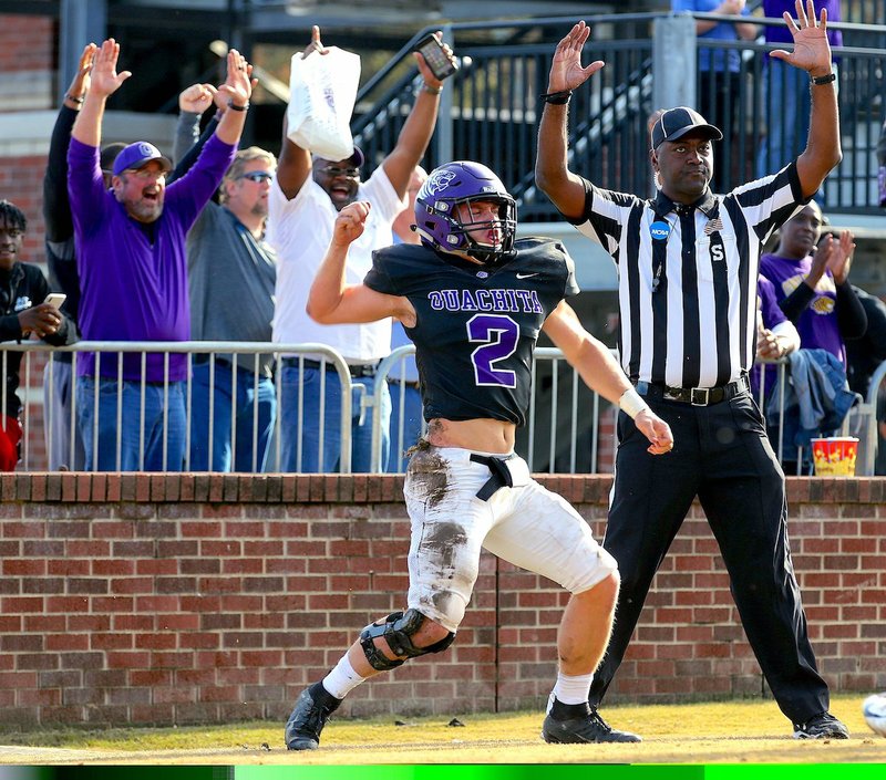 Arkansas Democrat-Gazette/Thomas Metthe PLAY IT OFF: Ouachita Baptist wide receiver Drew Harris (2) celebrates a week ago at Cliff Harris Stadium in Arkadelphia after scoring on an eight-yard touchdown reception in the second quarter of the Tigers' 35-7 win over Indianapolis in the NCAA Division II playoffs.