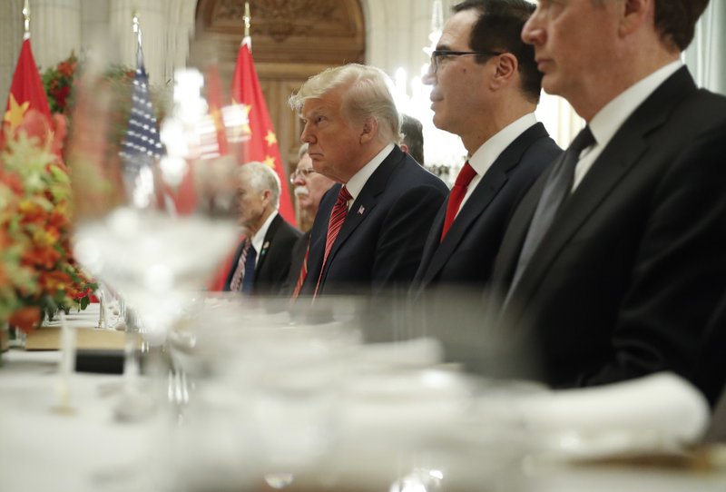 President Donald Trump, center, and Treasury Secretary Steve Mnuchin, second from the right, listen to remarks by China's President Xi Jinping during a bilateral meeting at the G20 Summit, Saturday in Buenos Aires, Argentina. (AP Photo/Pablo Martinez Monsivais)

