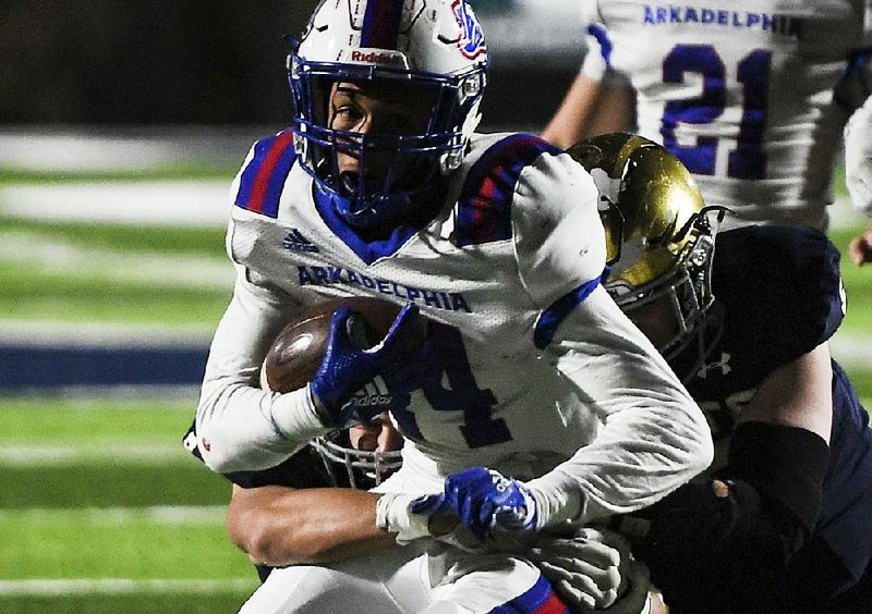 Arkadelphia running back Zion Hatley (24) scored on a 22-yard touchdown run with 4:53 left in the game to help give the Badgers a 30-17 victory over Shiloh Christian in Saturday’s Class 4A semifinal in Springdale. 