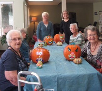 Courtesy photo The Garden Club of Rogers sponsors many projects throughout the year, one of which is Garden Therapy. The Garden Therapy committee goes to Apple Blossom Retirement Center once a month and does a hands-on workshop with the seniors. In October they decorated pumpkins for the residents to display. Pictured with the senior residents is Garden Therapy chairwoman Marcia Kroupa and club member Shannon Ellis.