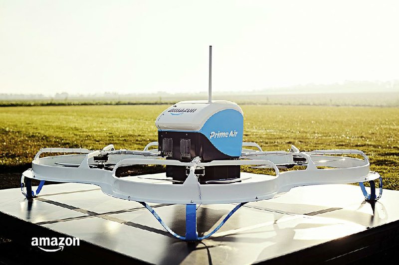 An Amazon Prime Air drone, developed for delivering packages, is shown in Cambridgeshire, United Kingdom, in December 2016. Amazon founder Jeff Bezos’ 2013 prediction that drones would be dropping off customers’ purchases in “four, five years” has proven wrong. 