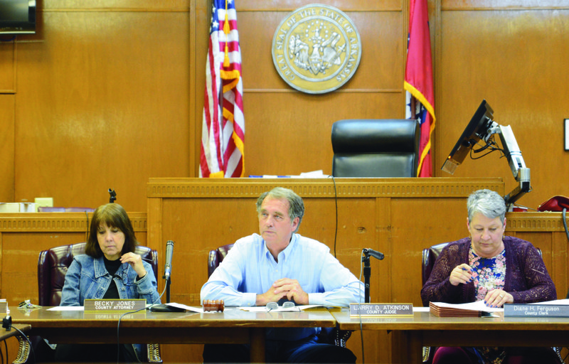 Columbia County Judge Larry Atkinson (middle), speaks Monday during the county’s monthly Quorum Court meeting at the Columbia County Courthouse in Magnolia. Also pictured are County Attorney Rebecca Jones (left) and Interim County Clerk Diane Ferguson.