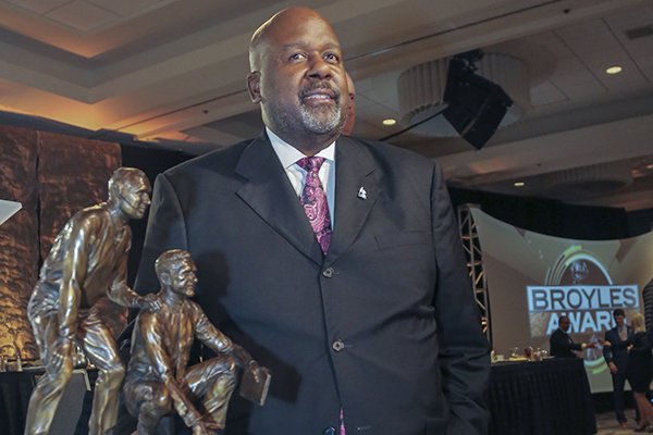 Alabama offensive coordinator Michael Locksley stands with the Broyles Award after he was named the recipient on Tuesday, Dec. 4, 2018, in Little Rock. 